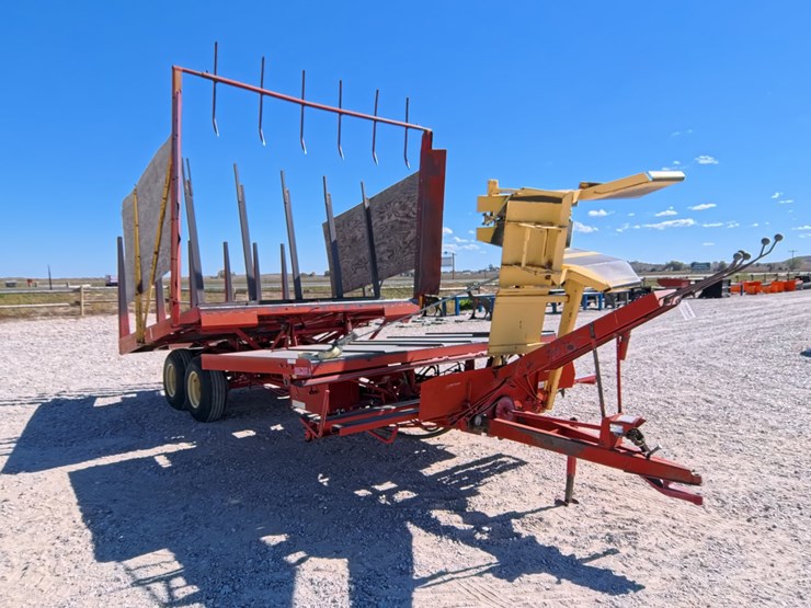 #1029-•-new-holland-1033-small-square-bale-stacker-image-7