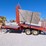 #1029-•-new-holland-1033-small-square-bale-stacker-image-1