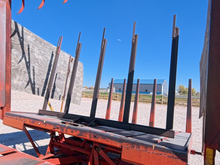 #1029-•-new-holland-1033-small-square-bale-stacker-image-17