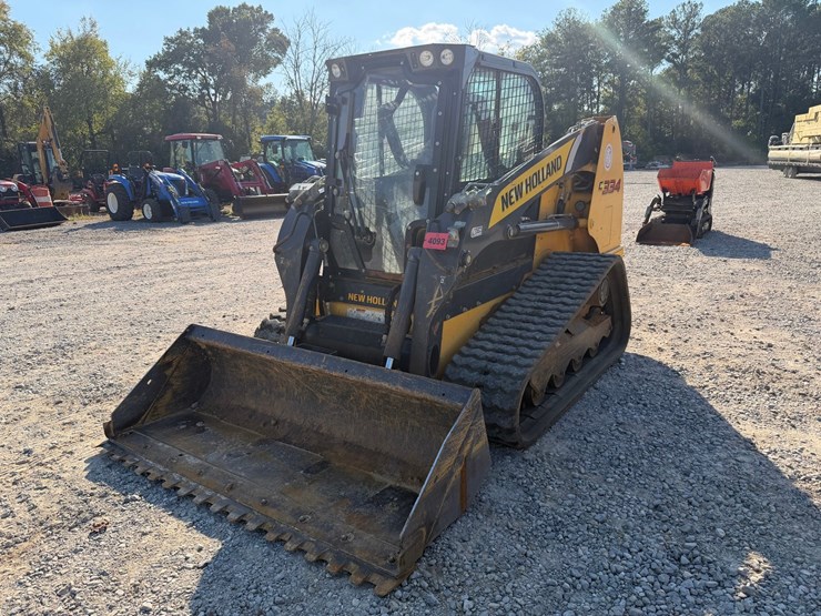 #4093-•-2023-new-holland-c334-tracked-skid-steer-image-1