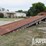 1995-landoll-8'6"w-x-48'oal-t/a-traveling-axle/hyd-tilt-trailer-image-6