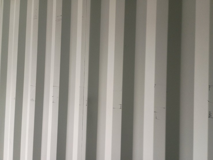 #l111-000-•-40ft-container-[damaged]-image-28