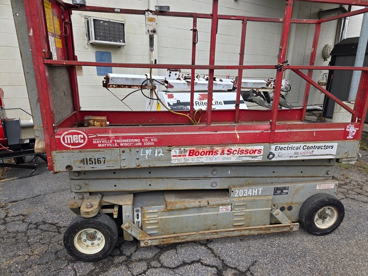 #12-•-mec-boom-scissor-lift-/-model:-2034ht-/-hours-not-known-image-1