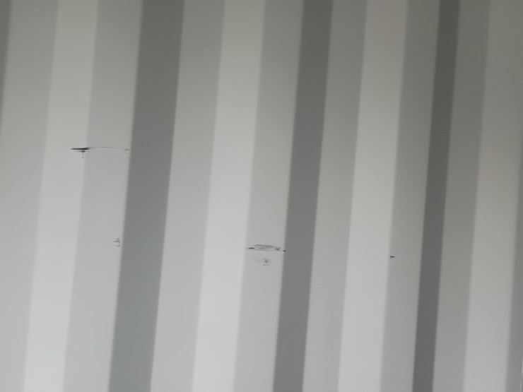 #l111-000-•-40ft-container-[damaged]-image-32
