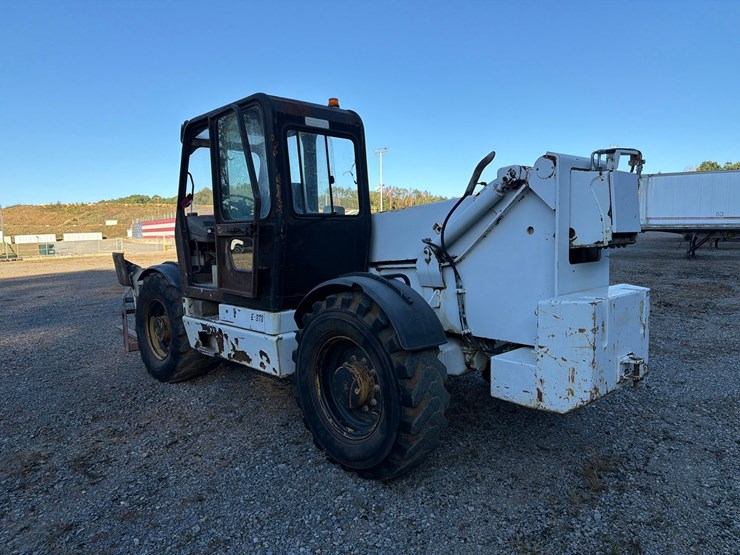 #4102-•-caterpillar-th103-telehandler-image-3