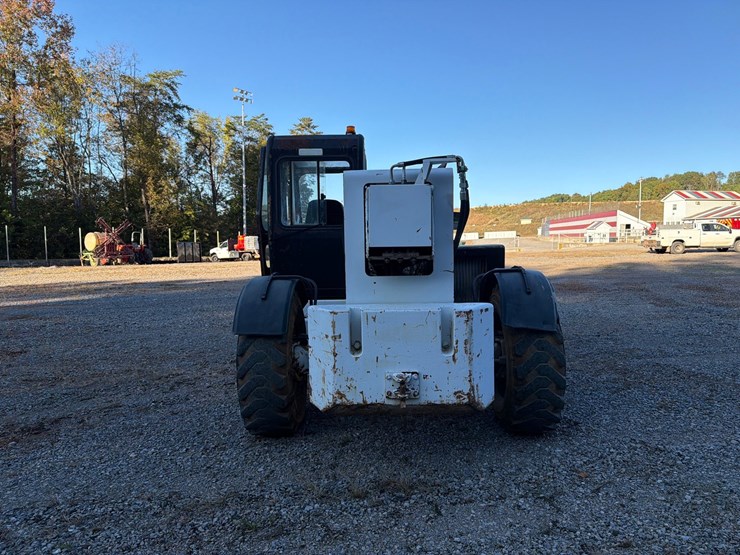 #4102-•-caterpillar-th103-telehandler-image-4