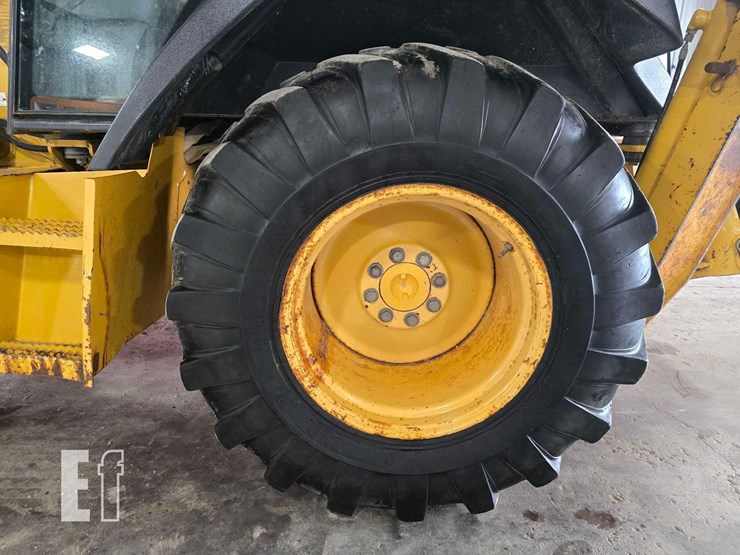 2003-deere-310g-image-34