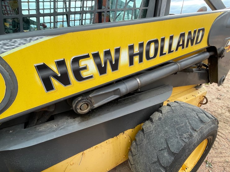#1083-•-new-holland-l185-wheeled-skid-steer-image-14