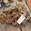 assortment-various-sized-chain,-hooks,-and-pieces-of-chain-image-1