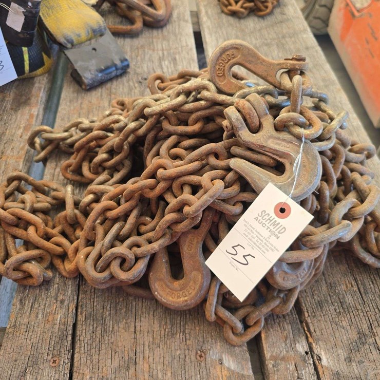 Assortment various sized chain, hooks, and pieces of chain