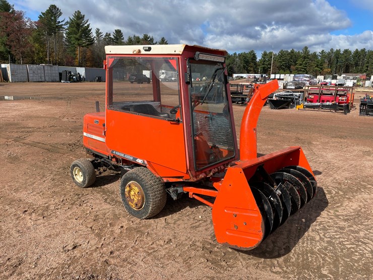 #1019-•-kubota-f2400-4wd-tractor-with-attachments-image-1