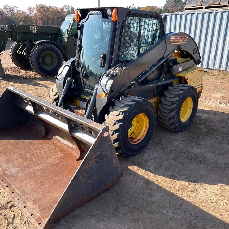 #1906 • New Holland L228 Skid Steer