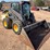 #1081-•-new-holland-l228-skid-steer-image-1