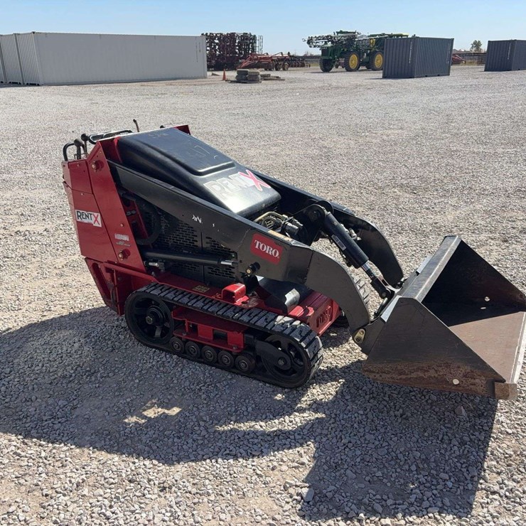 2023 Toro TX427 Tracked Dingo Model 22321, 570 hours, gas engine, Comes with 36” smooth bucket, s/n- 415182435