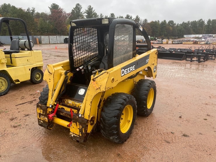 #1852-•-john-deere-317-skid-steer-image-1