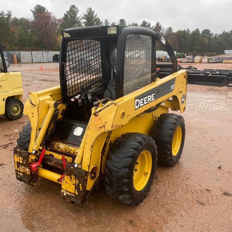 #1852 • John Deere 317 Skid Steer