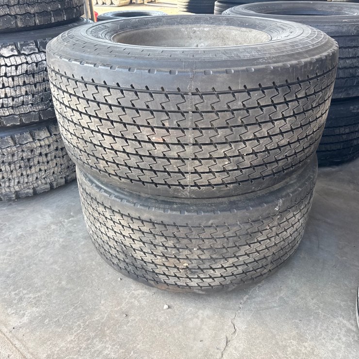#6989 • (2) Commercial Truck Tires with Rims