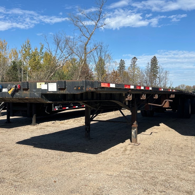 #6915 • 2010 Transcraft TL-2000H 48' Flatbed Trailer (WI Title In Delay)