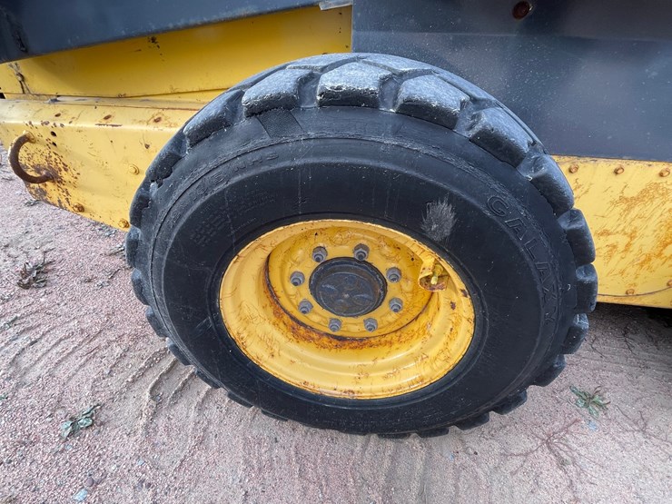#1947-•-new-holland-l185-wheeled-skid-steer-image-8