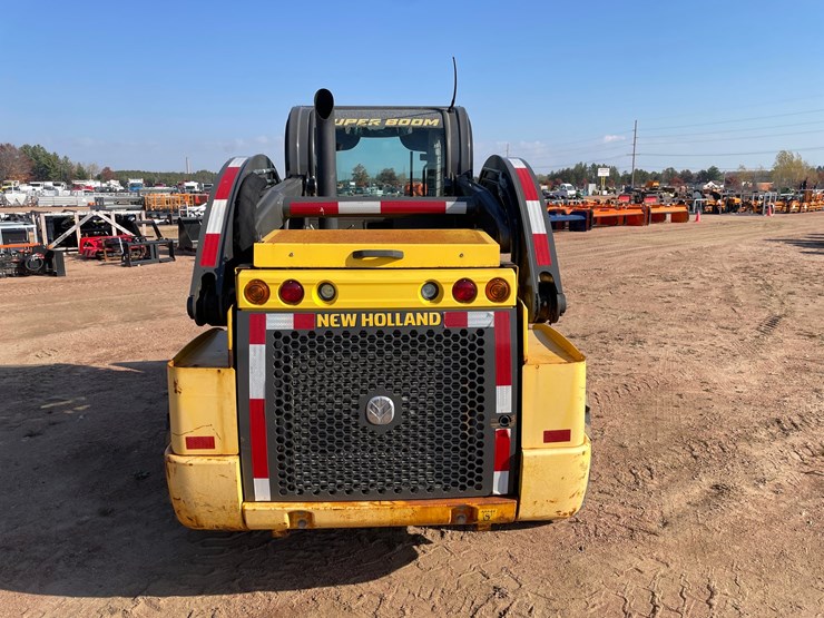 #1081-•-new-holland-l228-skid-steer-image-6