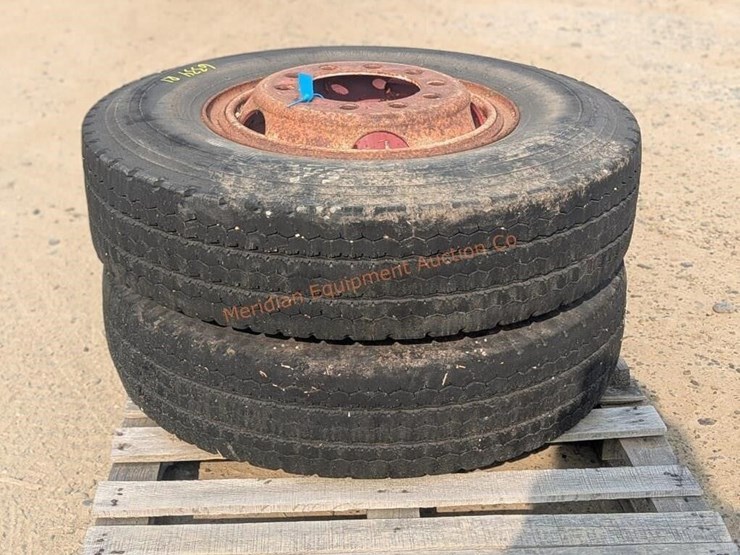 2--10.00-x-20-michelin-tires-w/-rims-image-1