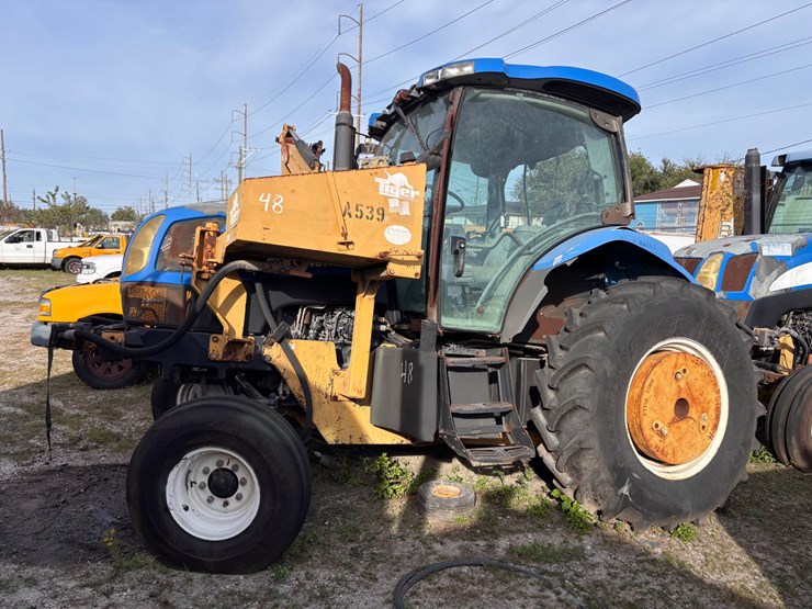 #48-•-new-holland-tractor-with-tiger-boom-mower-attachment-image-1