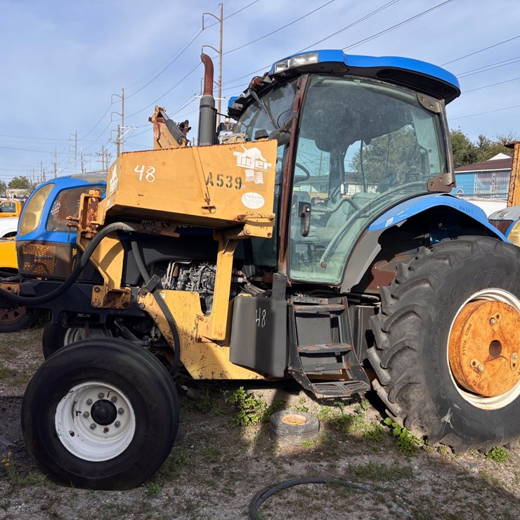 #48 • New Holland Tractor with Tiger Boom Mower Attachment