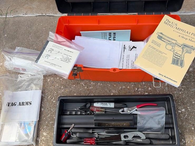 #88-•-orange-toolbox-with-gun-manuals,-and-tools-image-1