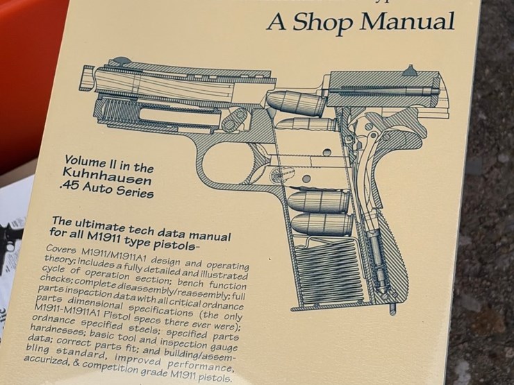#88-•-orange-toolbox-with-gun-manuals,-and-tools-image-3