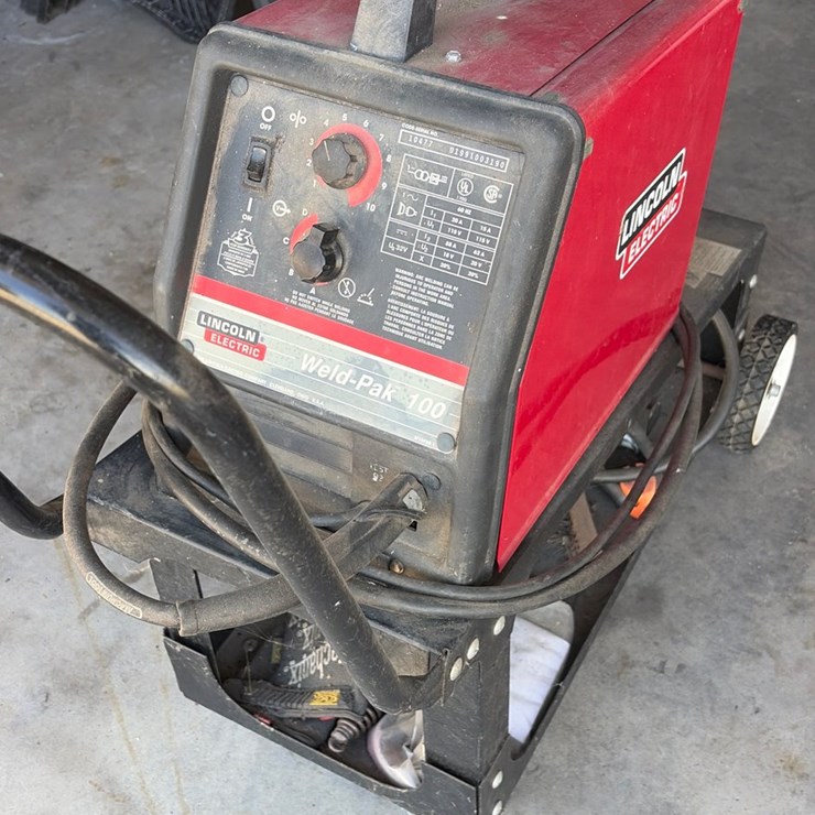 #49 • Lincoln Weld-Pak 100 ark welder with cart
