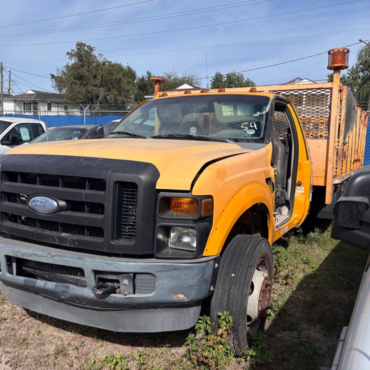#54 • 2010 Ford Super Duty Power Stroke Diesel Stake Bed Truck