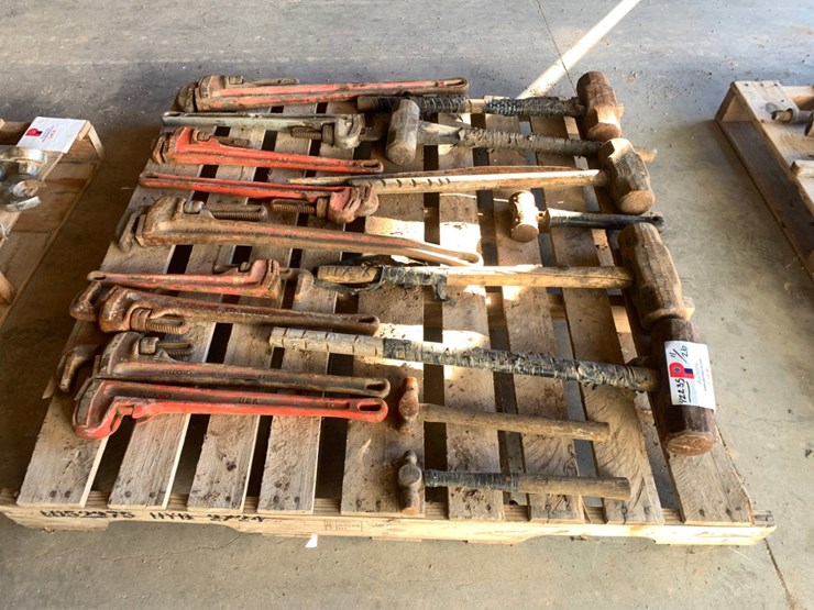 pallet-of-hammers-and-pipe-wrenches-image-1