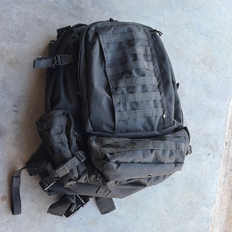 #79 • Black tactical backpack with Molly straps