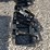 mini-skid-steer-black-hydraulic-root-grapple-attachment-image-2