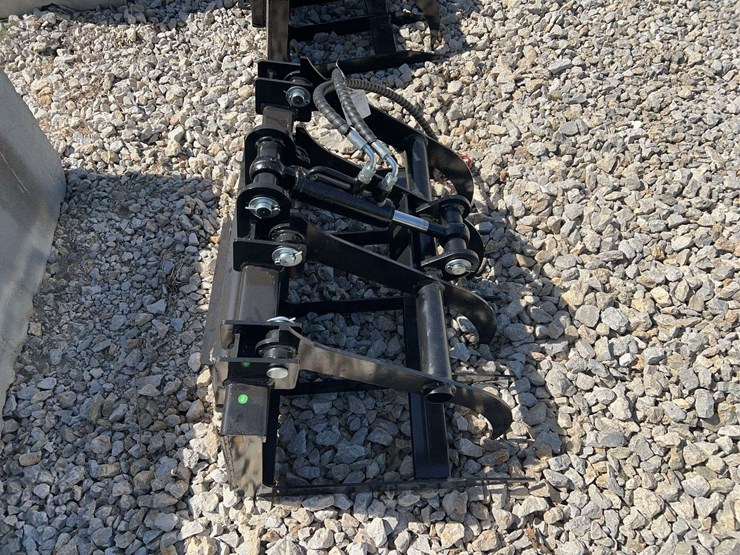 mini-skid-steer-black-hydraulic-root-grapple-attachment-image-2