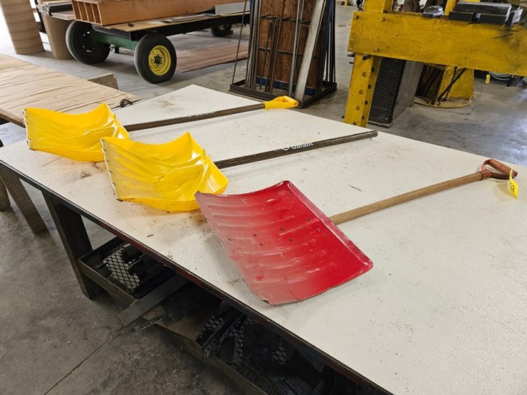 #9232-•-rack-of-assorted-snow-shovels-image-1