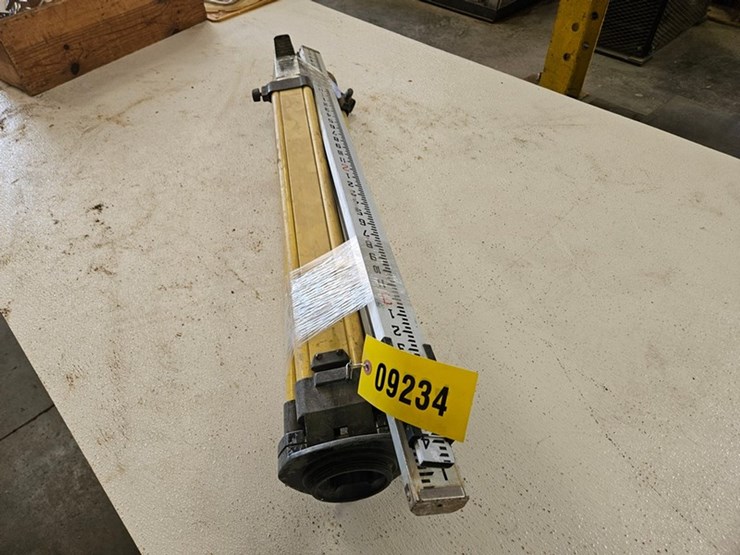 #9234-•-laser-level-tripod-and-measuring-sticks-image-2