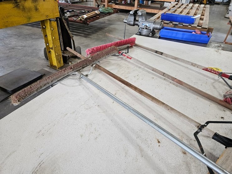 #9228-•-rack-of-assorted-brooms-image-7