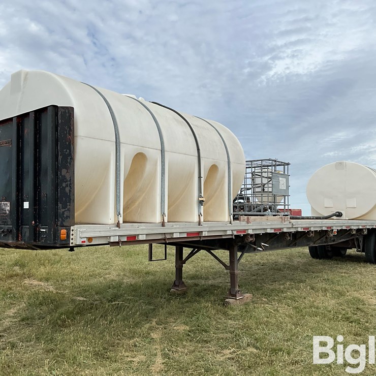 1987 Freuhauf 48’ T/A Flatbed Sprayer Tender Trailer