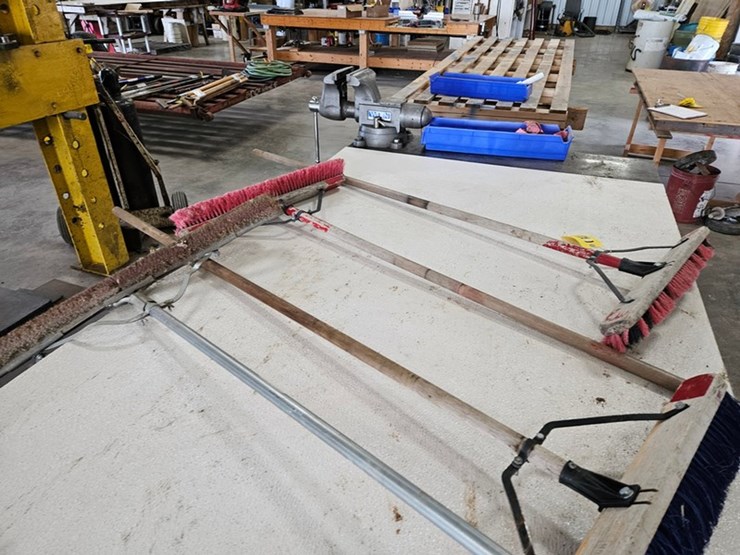 #9228-•-rack-of-assorted-brooms-image-9