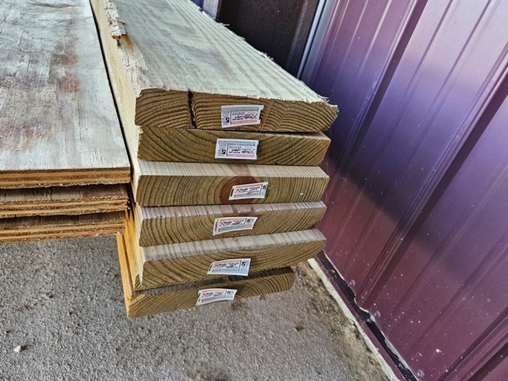 #9269-•-(7)-2"x10"x10'-treated-boards-image-2