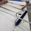 #9228-•-rack-of-assorted-brooms-image-6