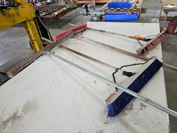 #9228-•-rack-of-assorted-brooms-image-5