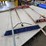 #9228-•-rack-of-assorted-brooms-image-4