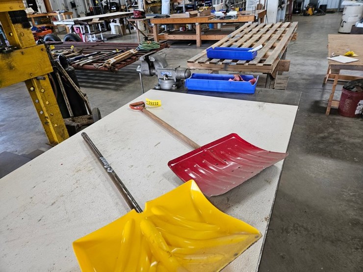 #9232-•-rack-of-assorted-snow-shovels-image-6