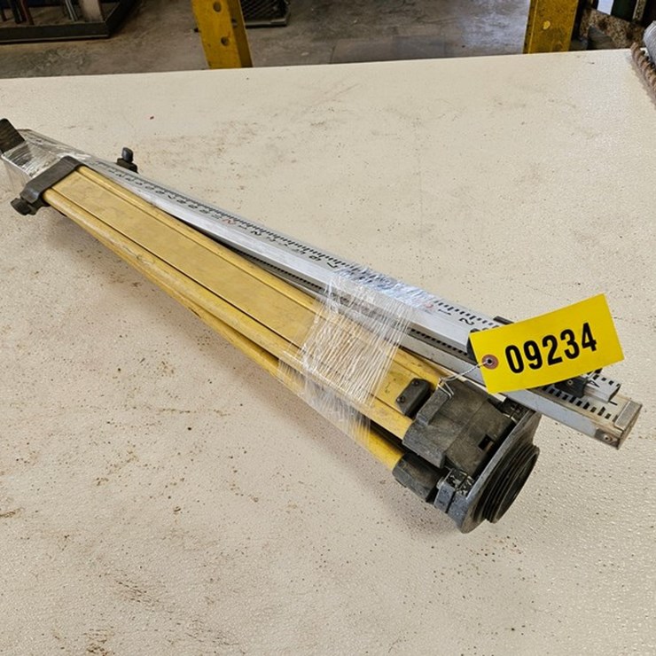 #9234 • Laser Level Tripod And Measuring Sticks